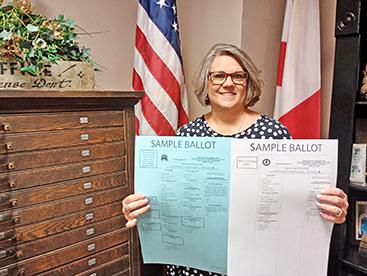 Winston County Elections Manager Sheila Moore shows both the Republican and Democrat ballot that voters must choose between when they go to the polls to vote in the upcoming primary election Tuesday, May 19.