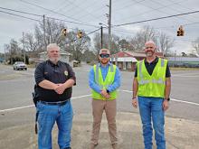 From left, Addison Police Chief Mitchell Woodard, Winston County Commissioner District 1 Rutger Hyche and Road Engineer James Glasgow at the busy intersection of Highway 278, County Road 41 and Old Cullman Road.