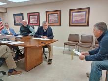 Addison Head Football Coach David Smothers expresses concerns to the Winston County Board of Education. Also shown are Winston County Schools Superintendent Jeff Scott and School Board Members Greg Densmore and Mark Finley.