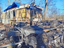 Very little remains of the camper Eddie HIll was living in at Double Springs after a fire Tuesday afternoon destroyed it.  The manufactured home next door, which also belongs to HIll, was destroyed by a tree falling on it two years ago.